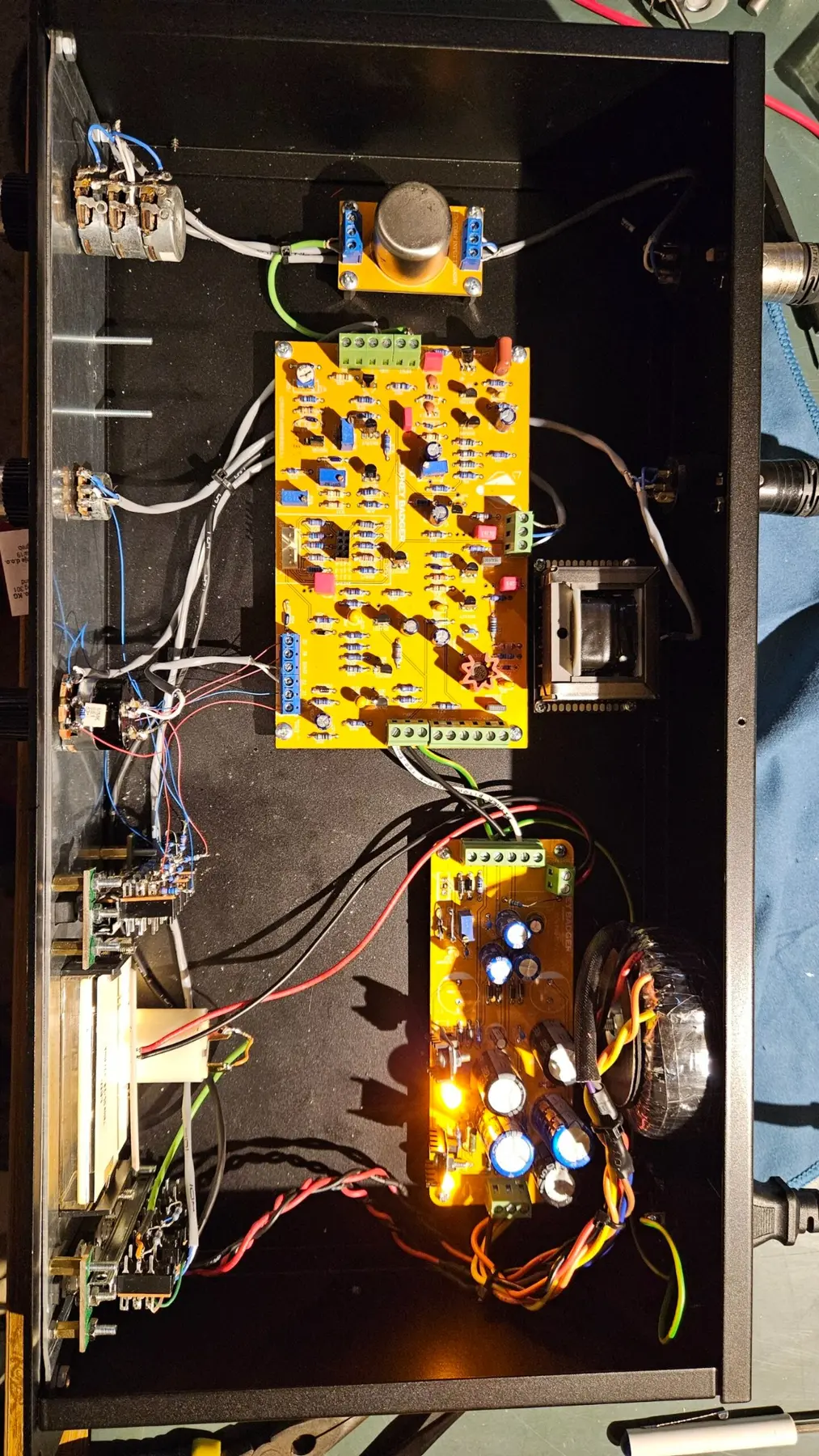 Detailed internal wiring and PCB placement in a HoneyBadger 1176 build